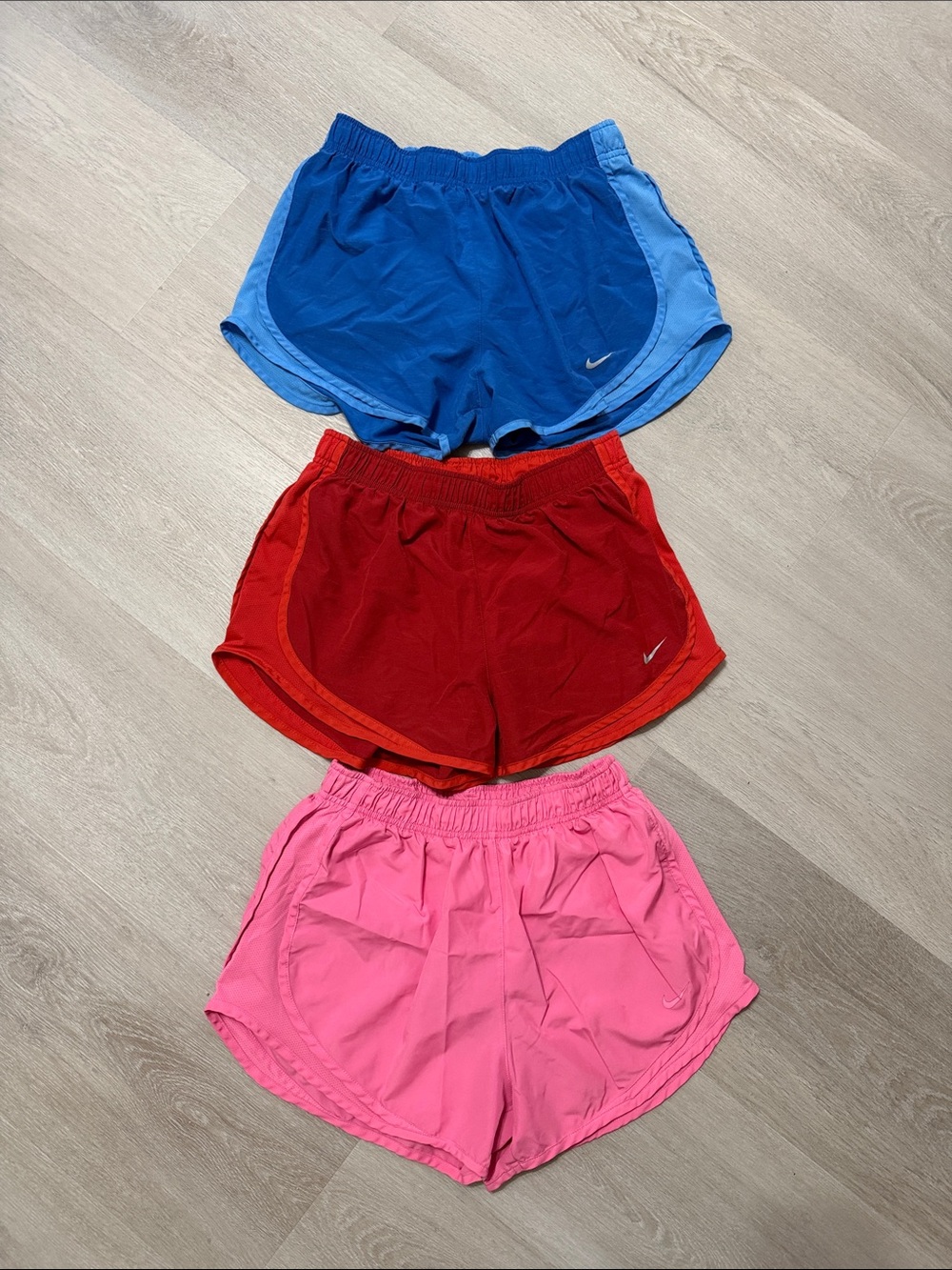 Women’s medium Nike shorts bundle blue, red, and pink